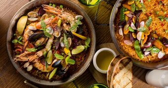 I work in a profession where I am often seen in a restaurant taking customers' orders. What am I?